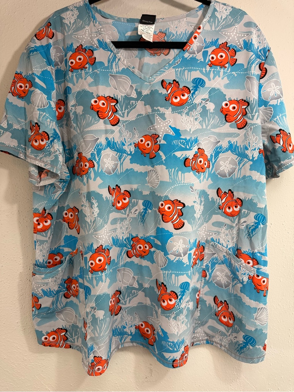 Disney Blue and Orange Clownfish Print Scrub Top